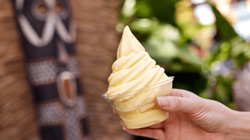hand holding yellow dole whip