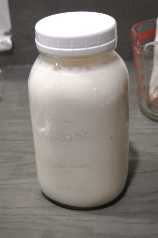 fortified almond milk in mason jar with white top