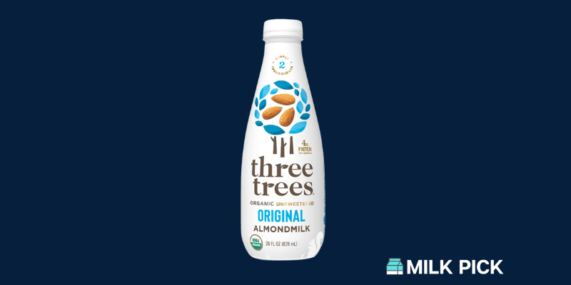 three trees almond milk on blue background