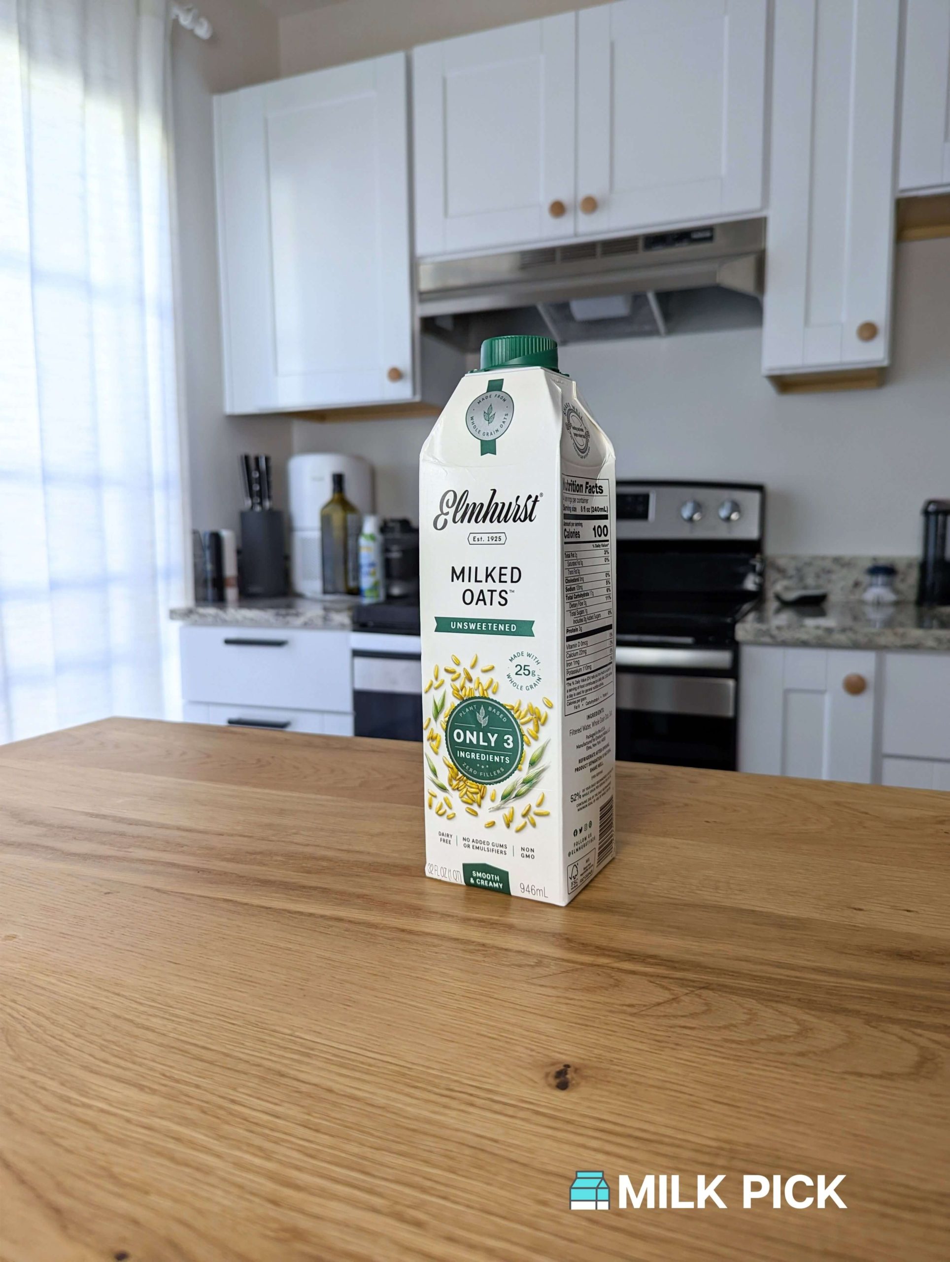 elmhurst oat milk on kitchen island