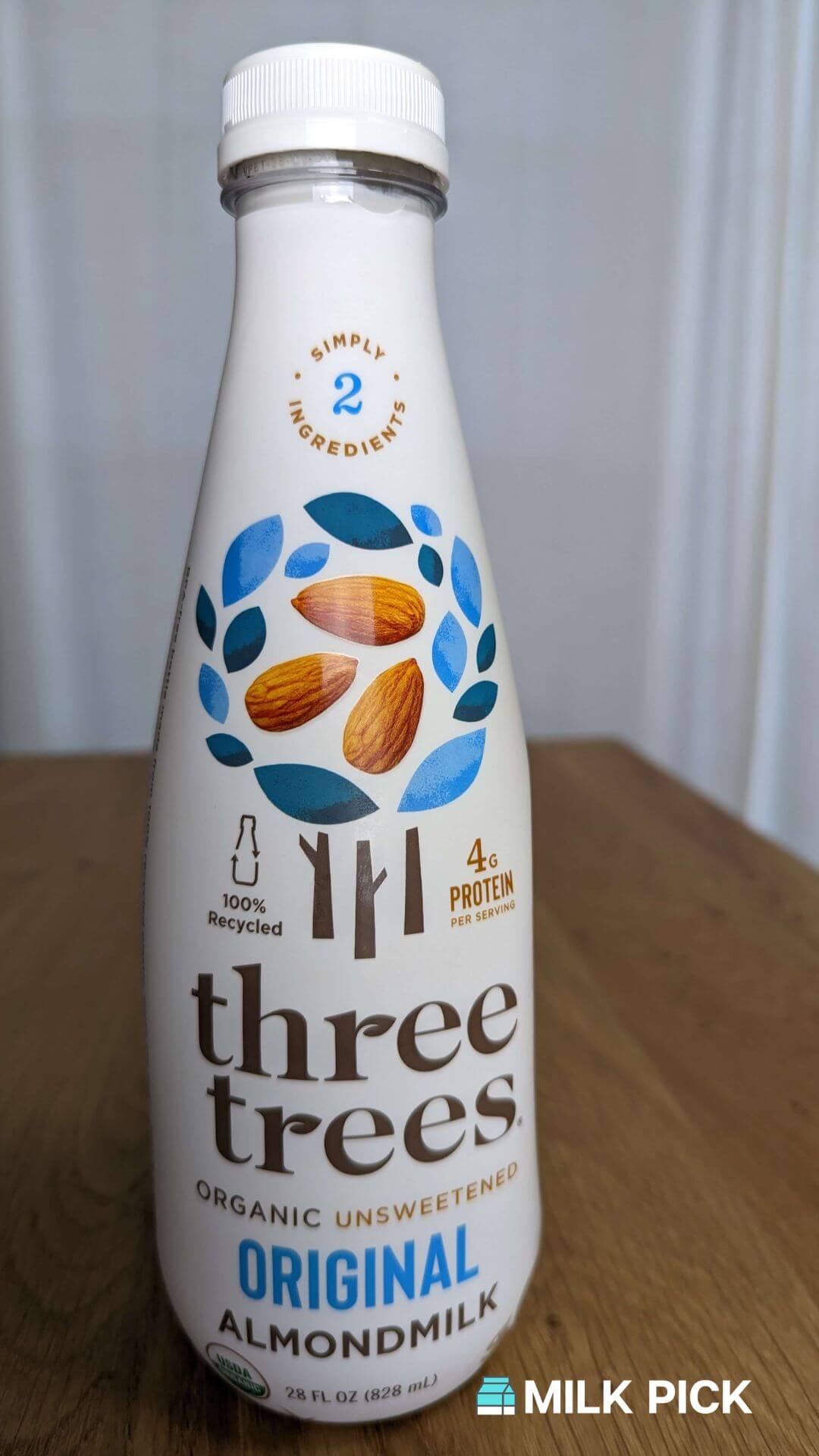 three trees almond milk on kitchen island