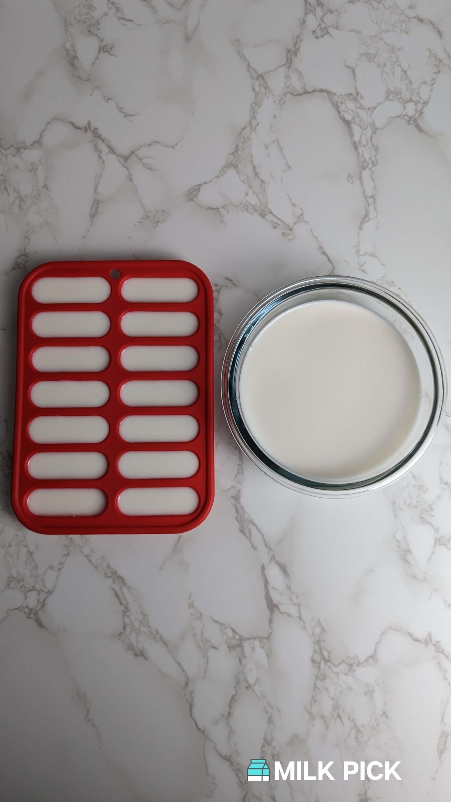 almond milk in ice cube tray and glass container side-by-side