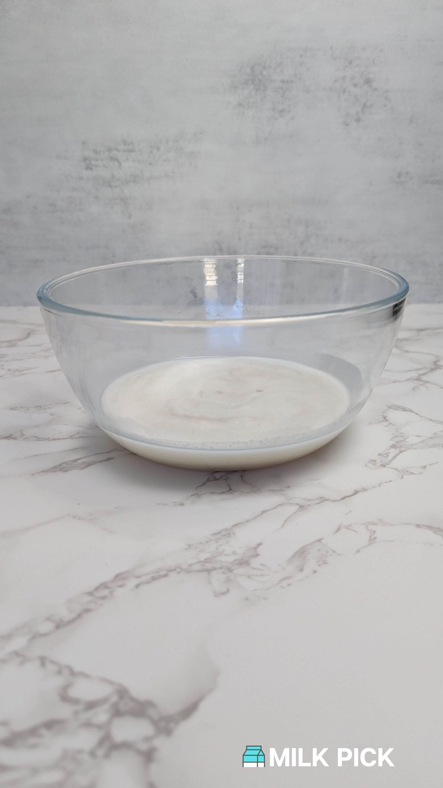 defrosted almond milk in glass bowl