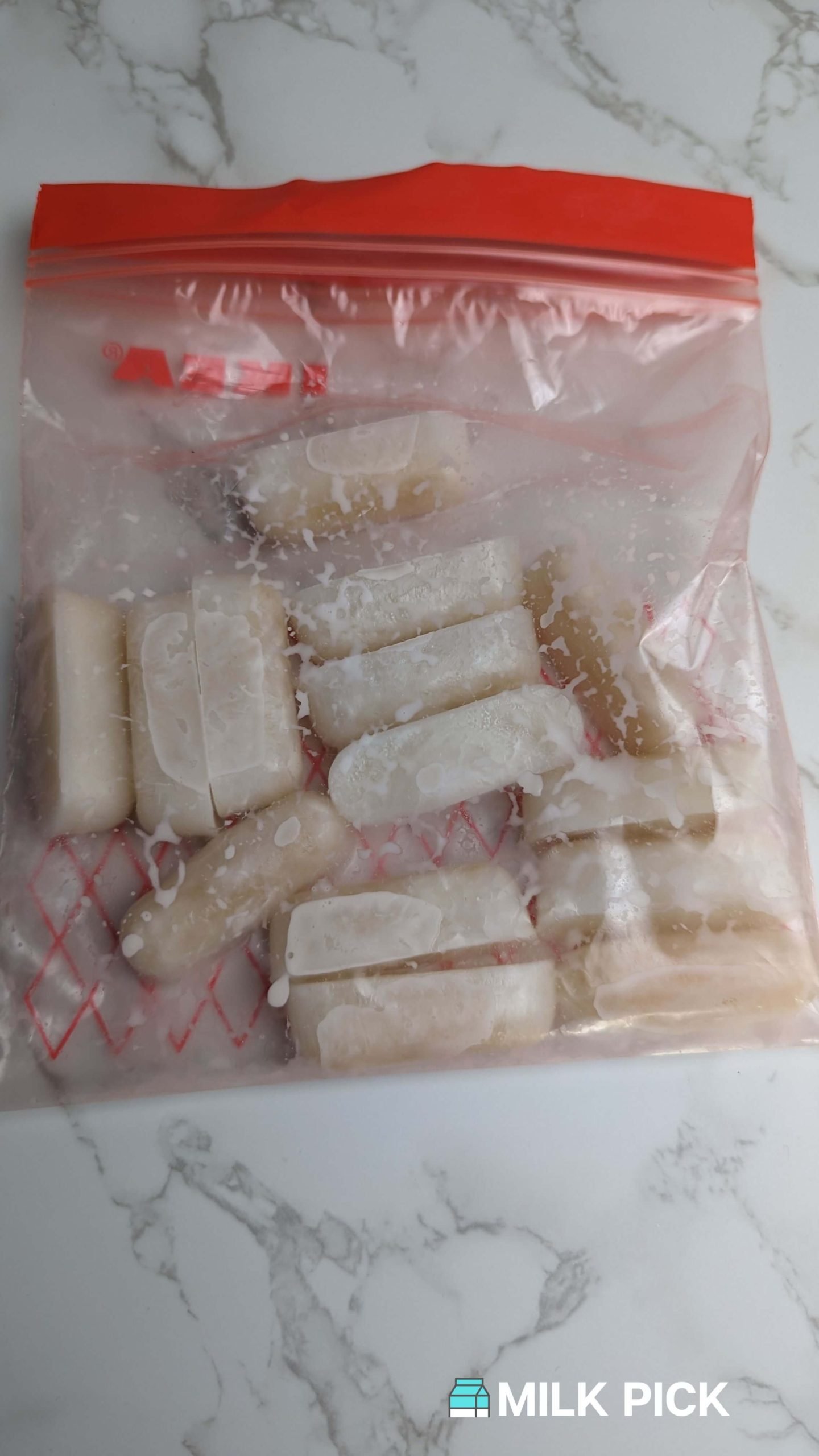 frozen almond milk cubes melting in plastic bag