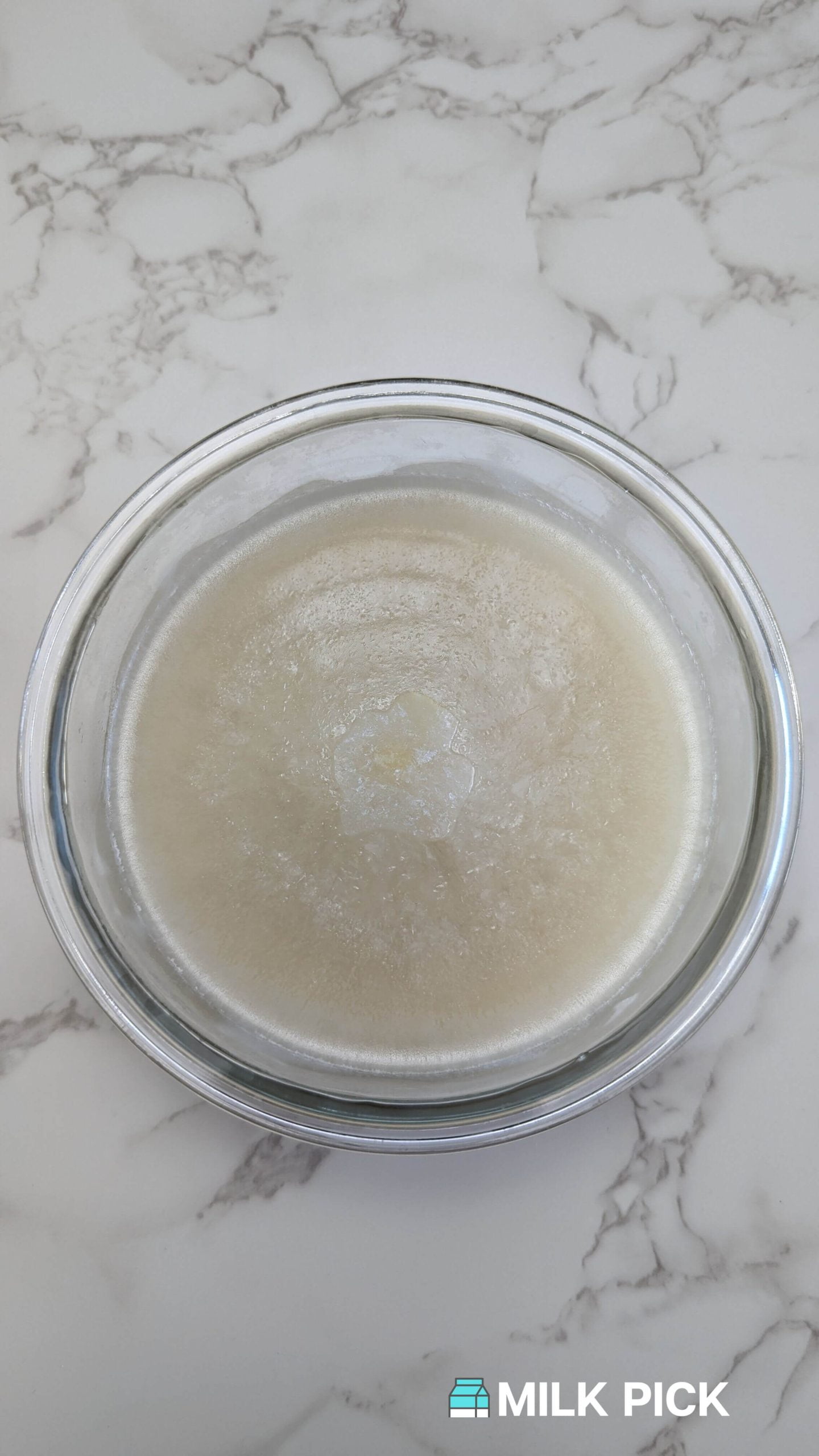 frozen almond milk in glass bowl