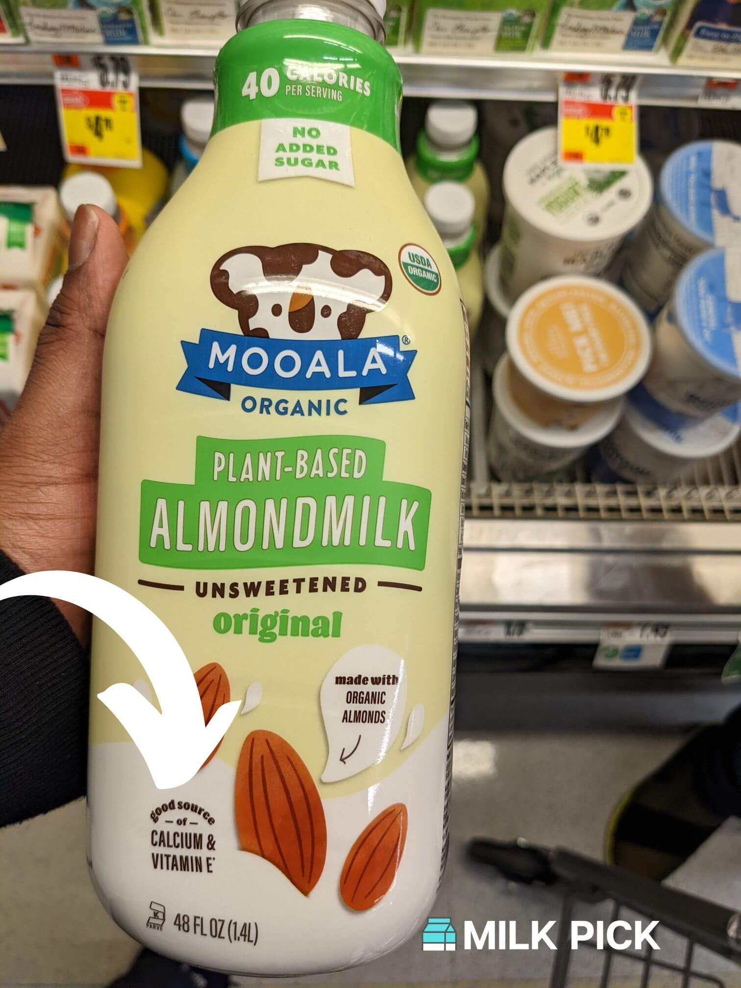 mooala unsweetened almond milk with arrow pointing to calcium and vitamin e