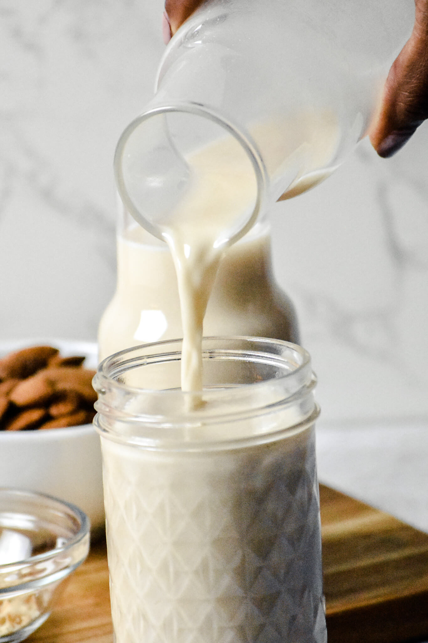 pouring toasted coconut almond milk
