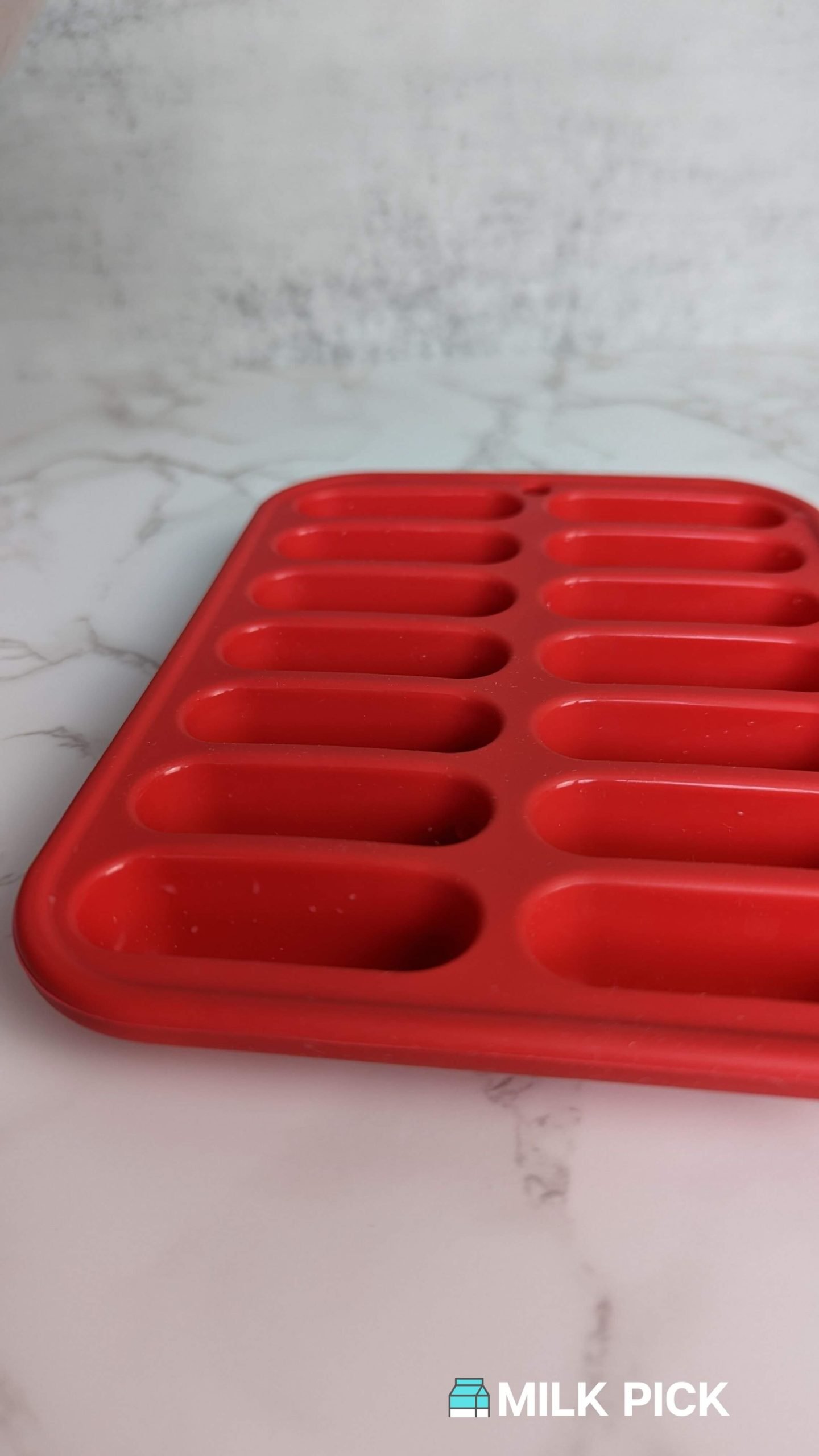 red empty ice cube tray