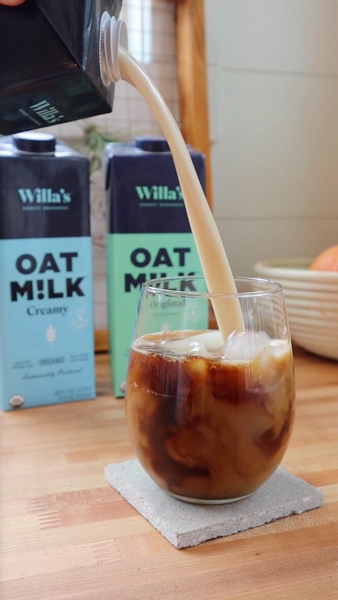 willas unsweetened oat milk poured into coffee