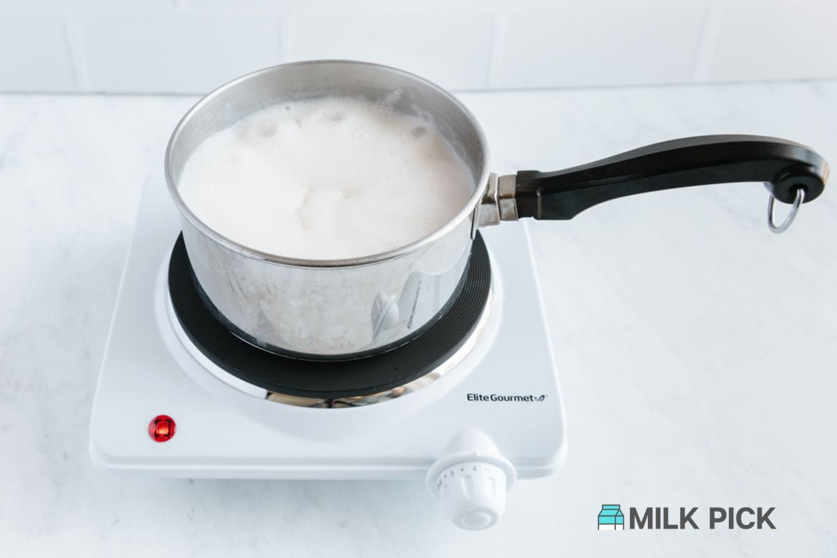 almond milk boiling in pot