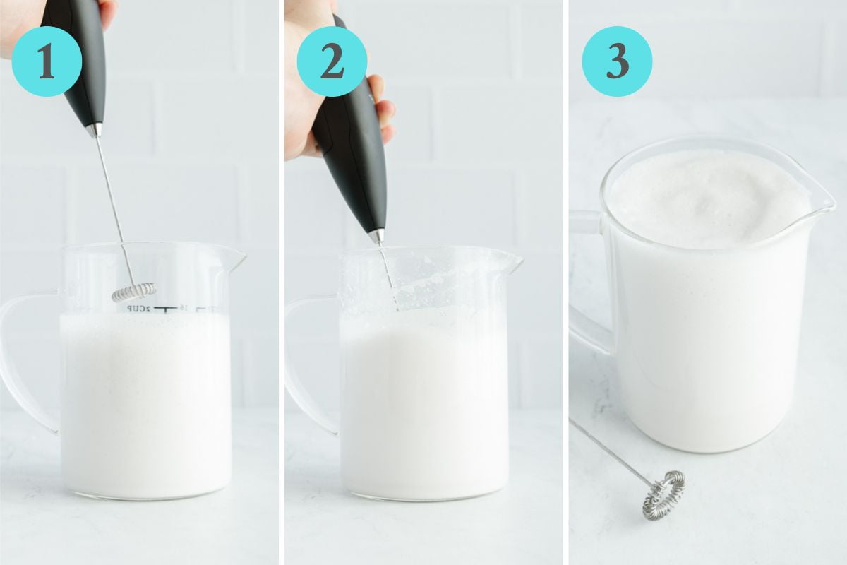 frothing almond milk with handheld frother