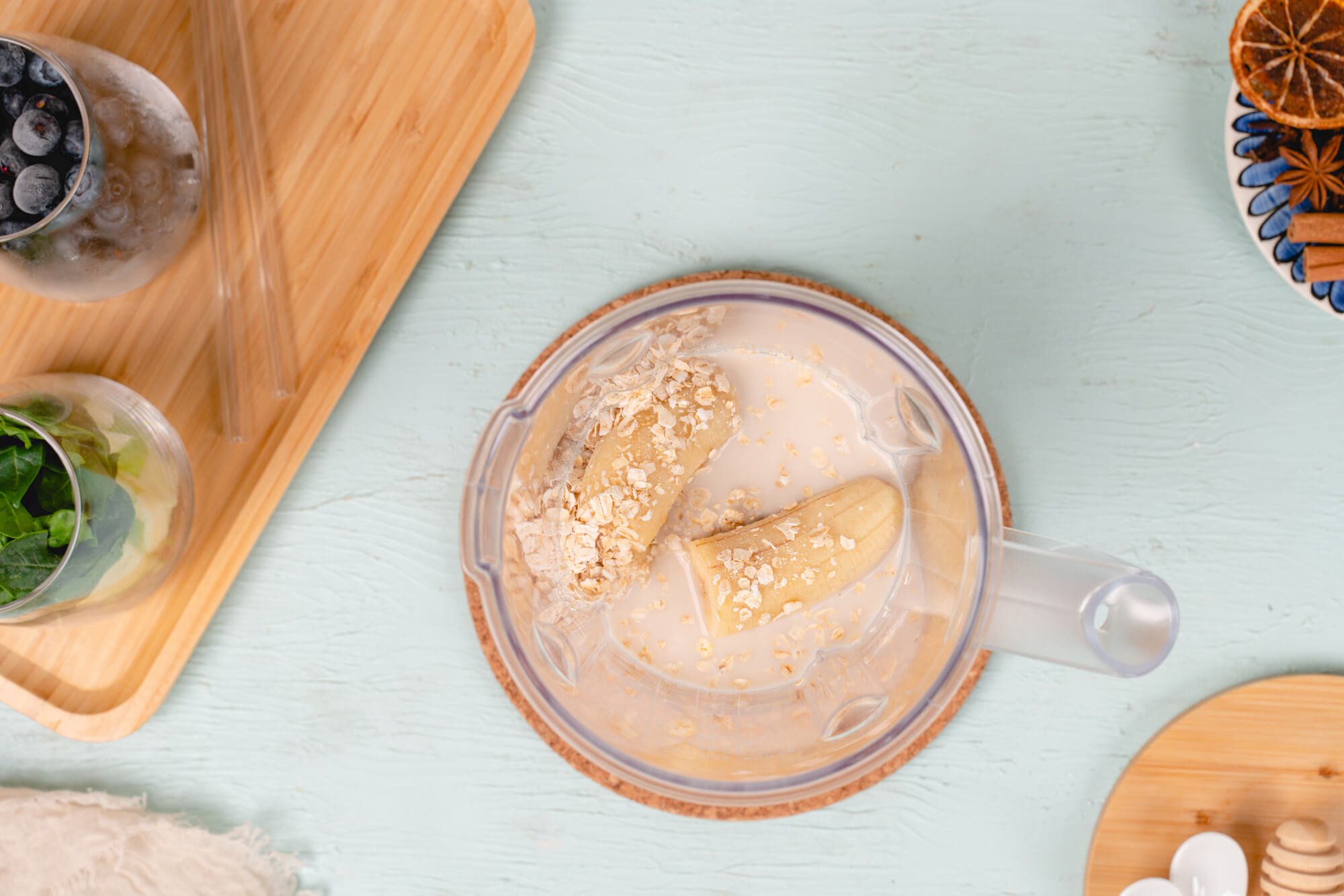 frozen banana almond milk and oats in blender
