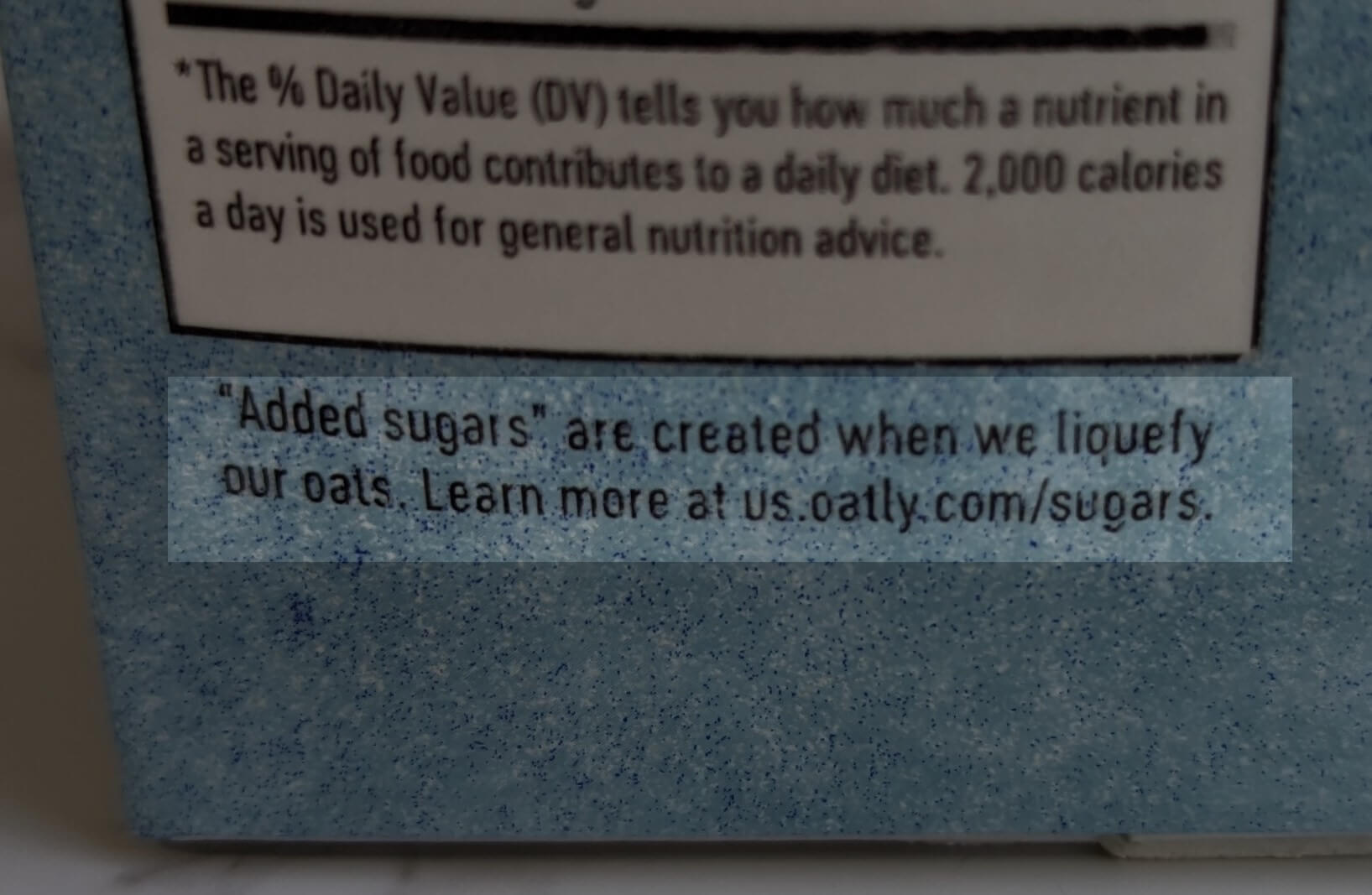 message on oatly carton regarding added sugars