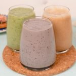 three almond milk smoothies on trivet