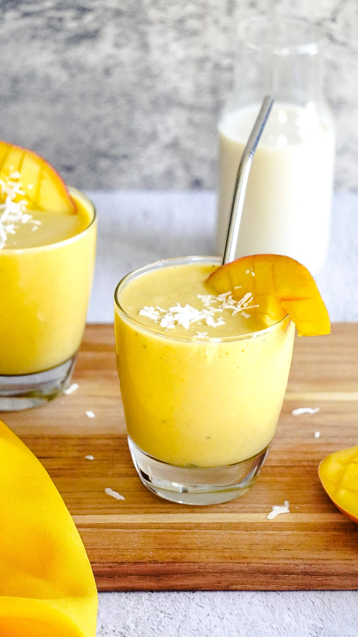 dairy-free mango smoothie with straw
