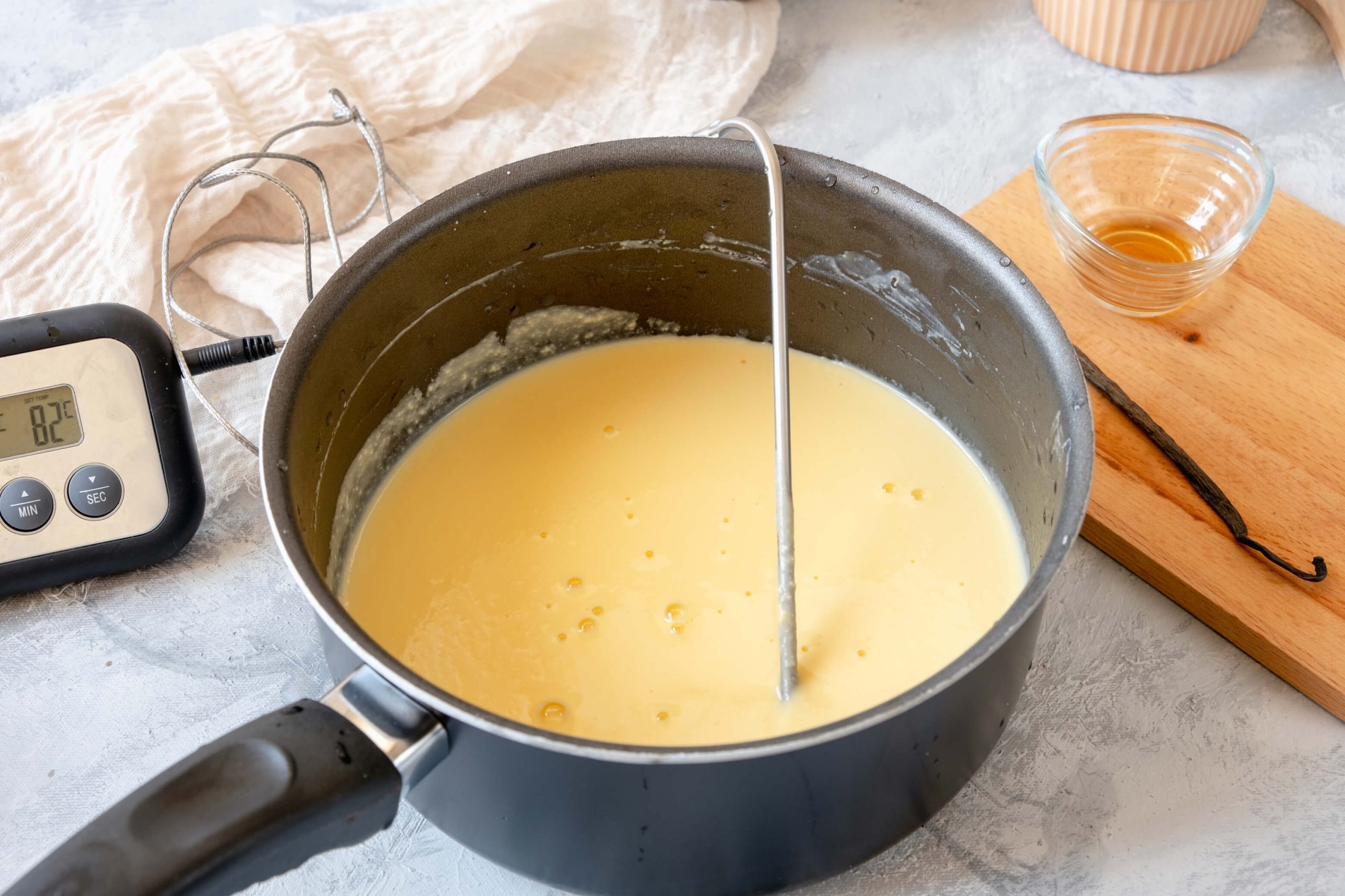 heating almond milk custard in saucepan