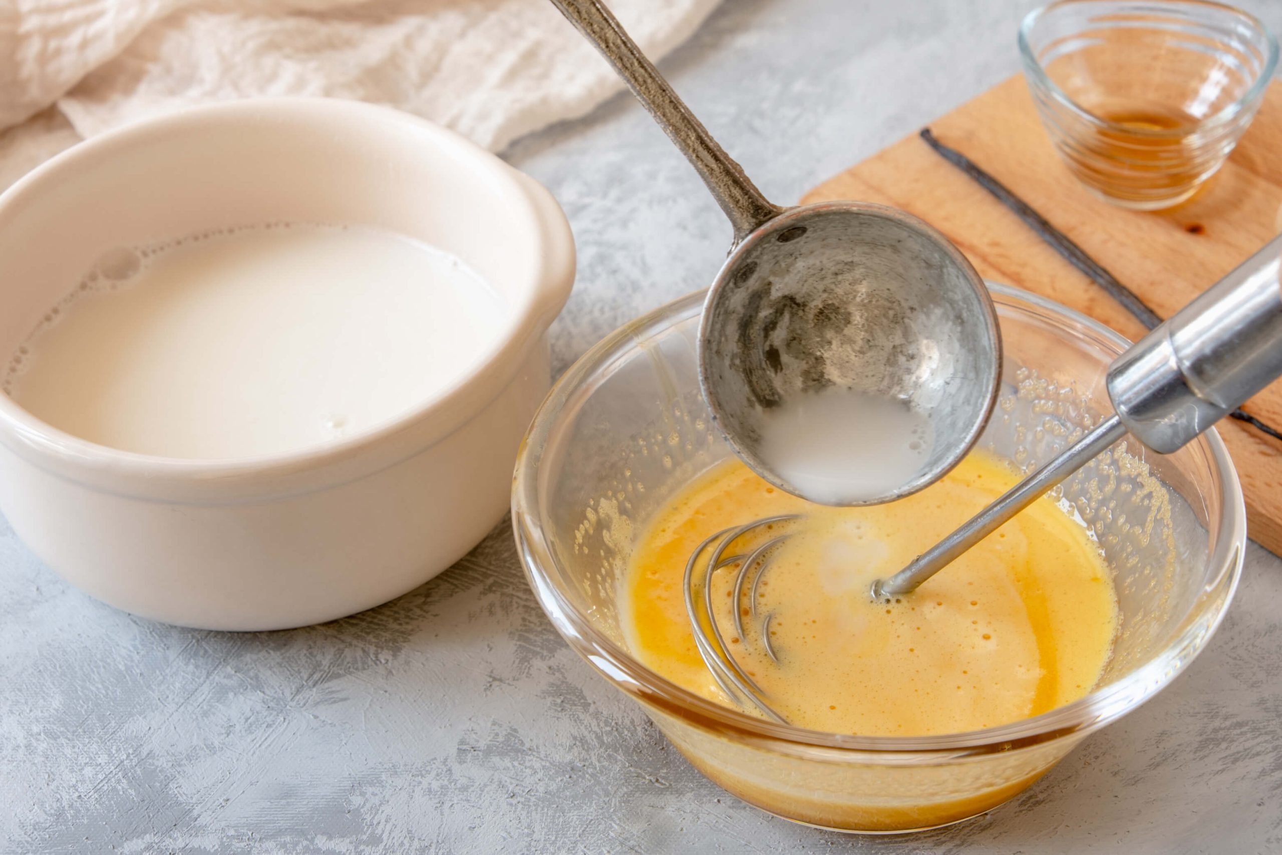 whisking almond milk and egg mixture