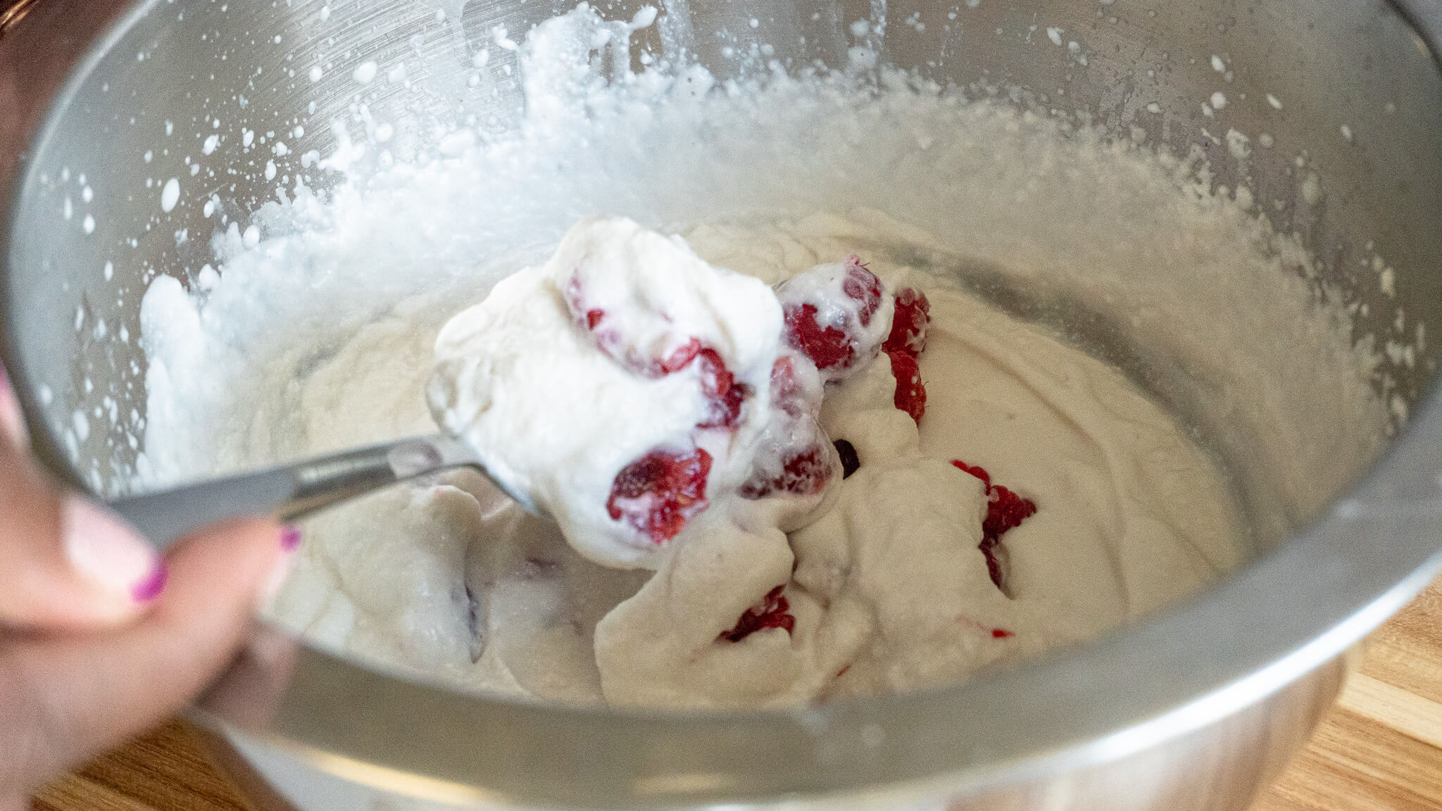 raspberries folded into non-dairy ice cream