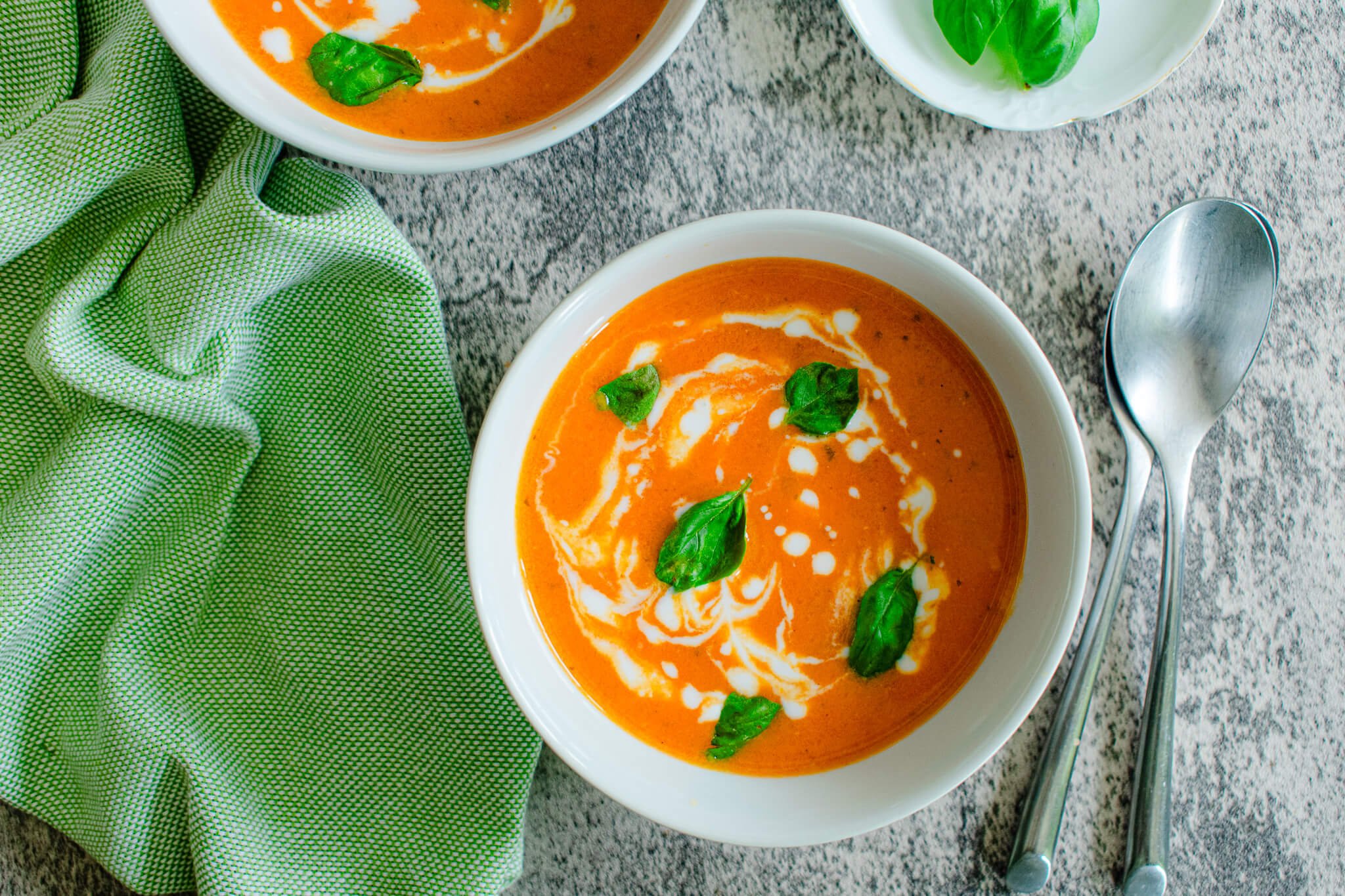 dairy-free tomato soup with coconut milk drizzle